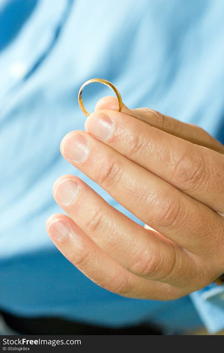 Man Holding Ring - vertical