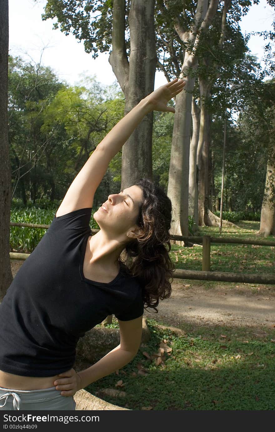 Woman Stretching Her Arms - Vertically Framed