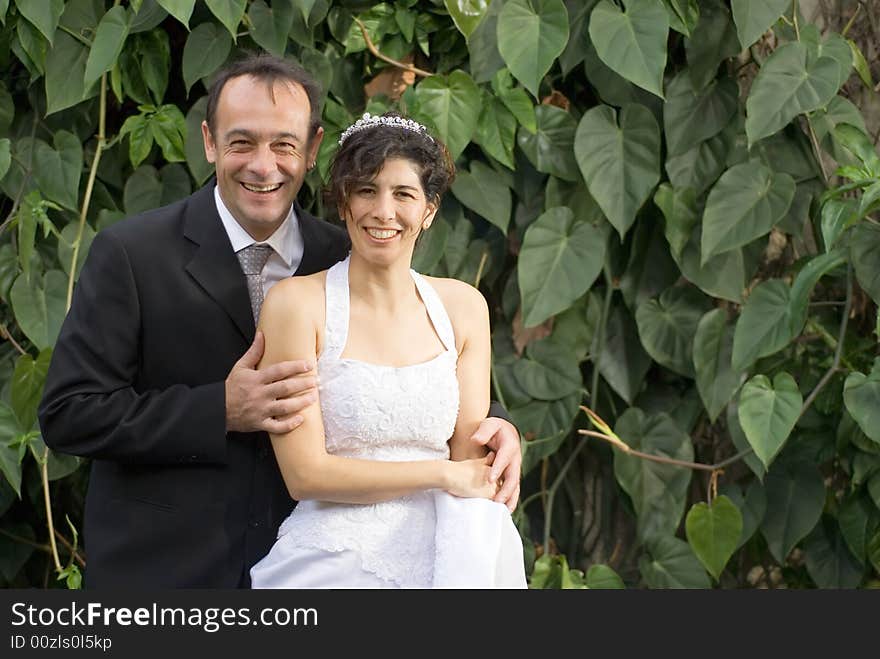 Newly Weds Smile at Camera - horizontal