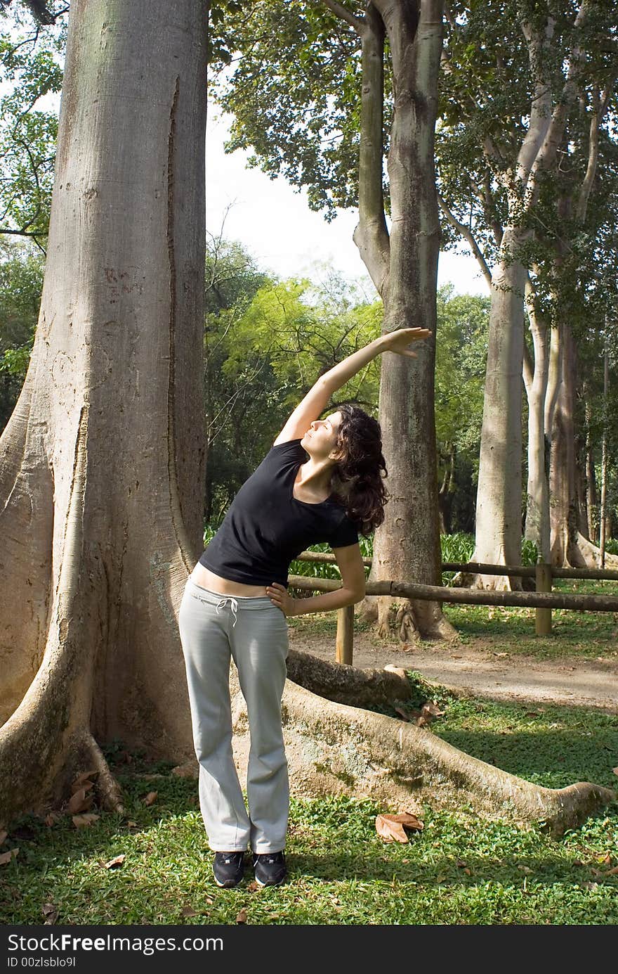 Woman Stretching Her Arms - Vertically framed