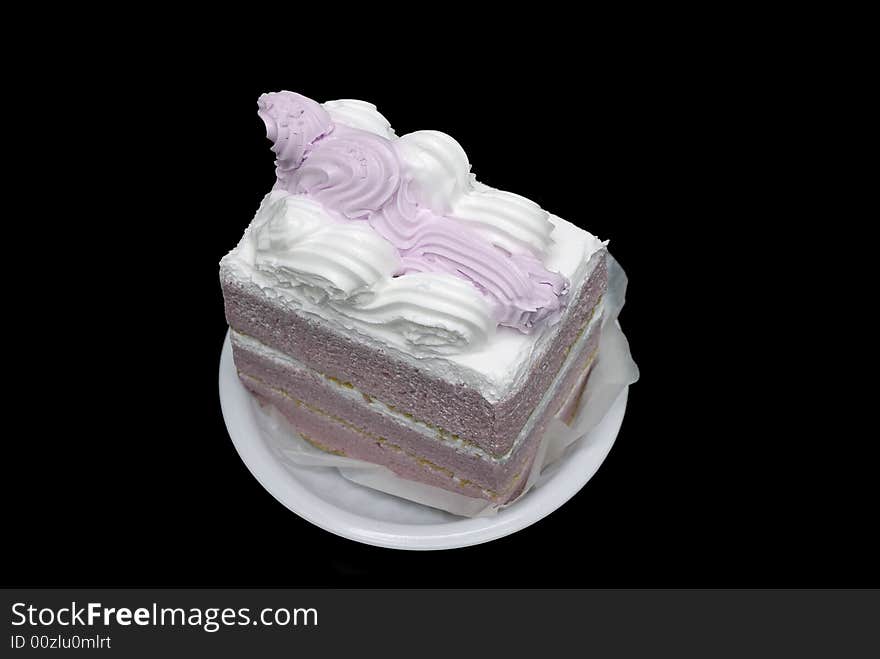 Isolsted cake on black background. Isolsted cake on black background