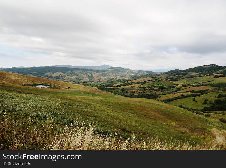 The artificial lake of Casoli in Abruzzo and the fields of wheat around