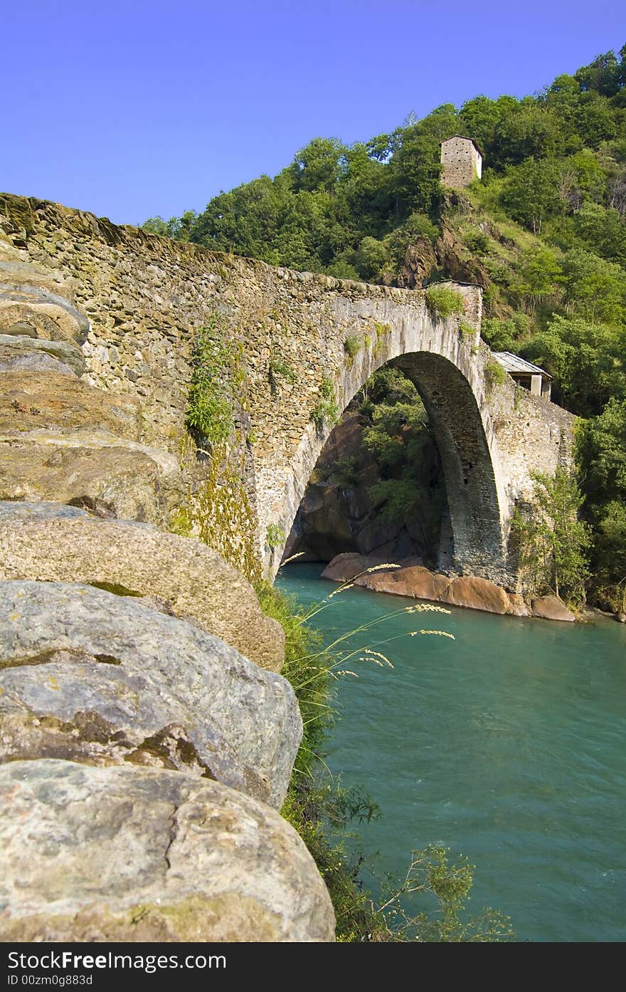 The legend says that It was the devil that built this bridge over the green waters of river Stura (Italy). The legend says that It was the devil that built this bridge over the green waters of river Stura (Italy).