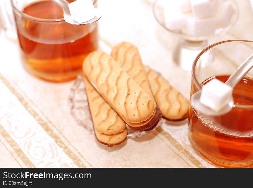 Table set for tea with sweet cookies