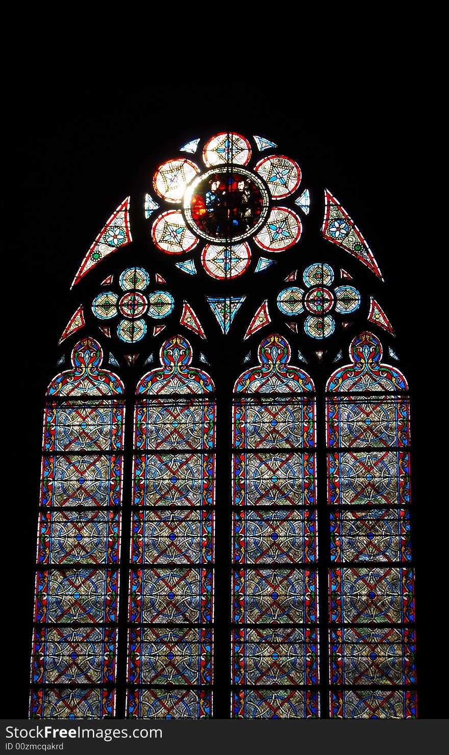 Stained-glass window. Notre Dame Cathedral. Paris, France