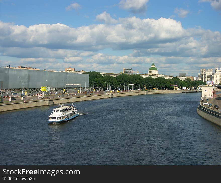 Quay on river  in city center at summer