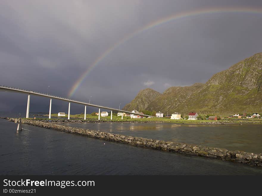 Nearly to the sunset a rainbow came out. Nearly to the sunset a rainbow came out