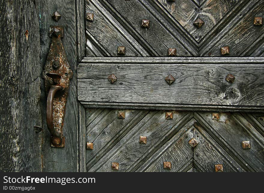 Old door with a lock close up