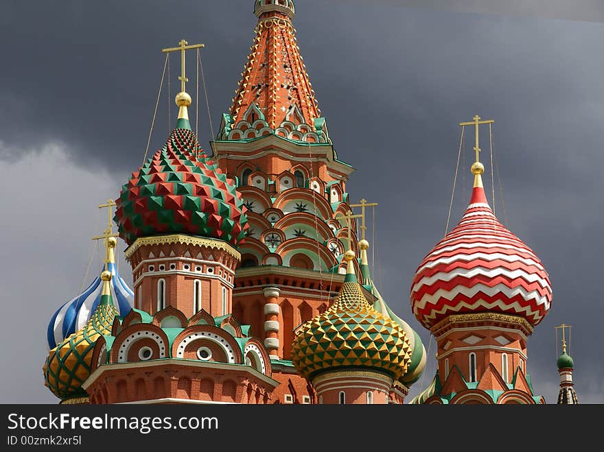 Cupolas and domes of Church of desposition of Saint Virgin's Rone also known as Satin Basil's Cathedral of Red Suqre in Moscow, Russia. Cupolas and domes of Church of desposition of Saint Virgin's Rone also known as Satin Basil's Cathedral of Red Suqre in Moscow, Russia