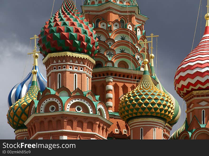 Cupolas and domes of Church of desposition of Saint Virgin's Rone also known as Satin Basil's Cathedral of Red Suqre in Moscow, Russia. Cupolas and domes of Church of desposition of Saint Virgin's Rone also known as Satin Basil's Cathedral of Red Suqre in Moscow, Russia