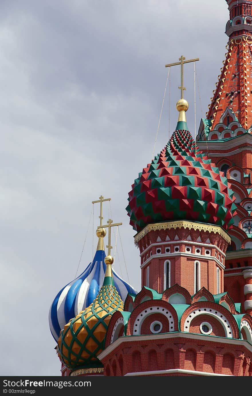 Cupolas and domes of Church of desposition of Saint Virgin's Rone also known as Satin Basil's Cathedral of Red Suqre in Moscow, Russia. Cupolas and domes of Church of desposition of Saint Virgin's Rone also known as Satin Basil's Cathedral of Red Suqre in Moscow, Russia