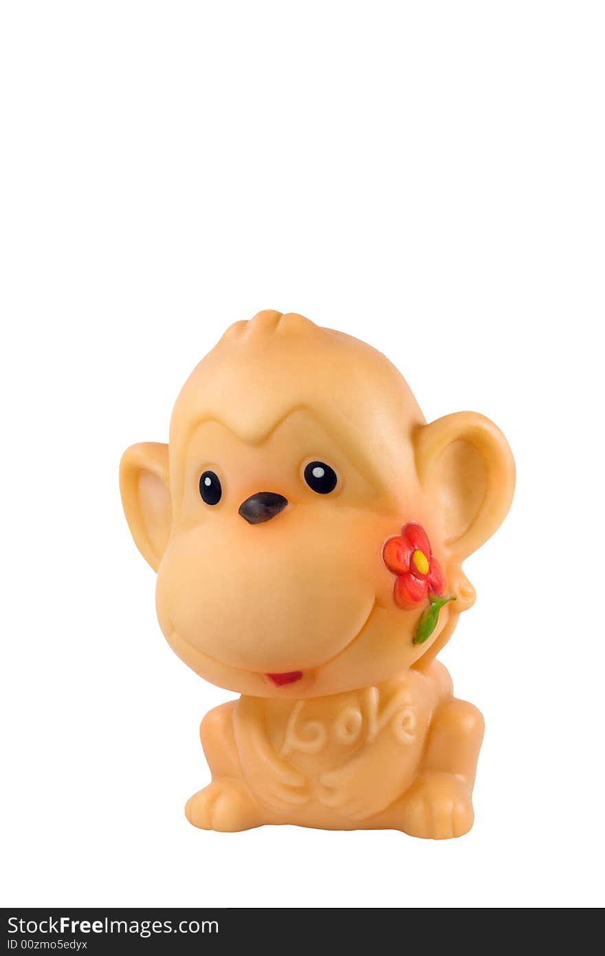 Dirt monkey with the flower in the mouth(isolated)