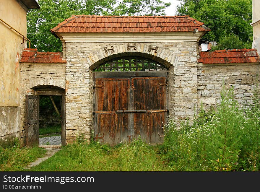 Old wooden gate in a court yard of the old city of Kamenets Podolsk Ukraine