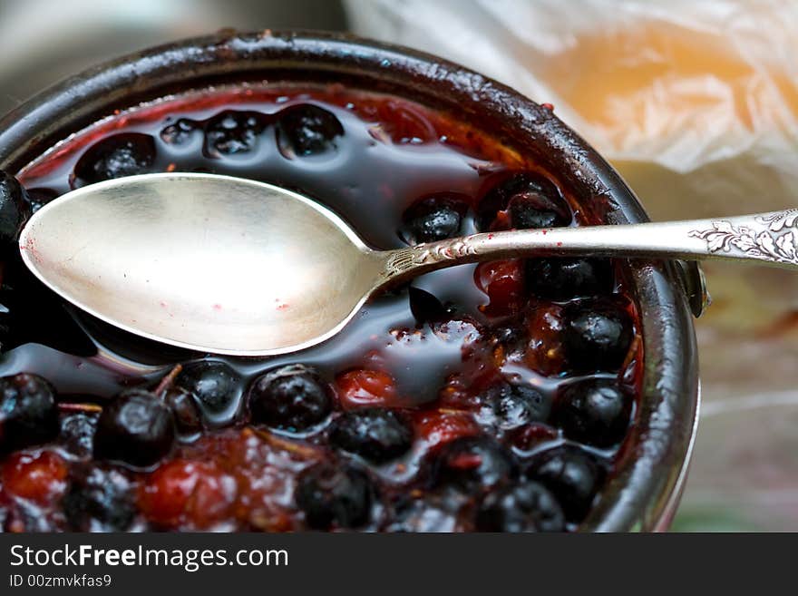 Bowl with berries and a spoon