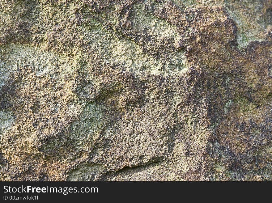 Stone natural foundation of a covered bridge that can be used for background