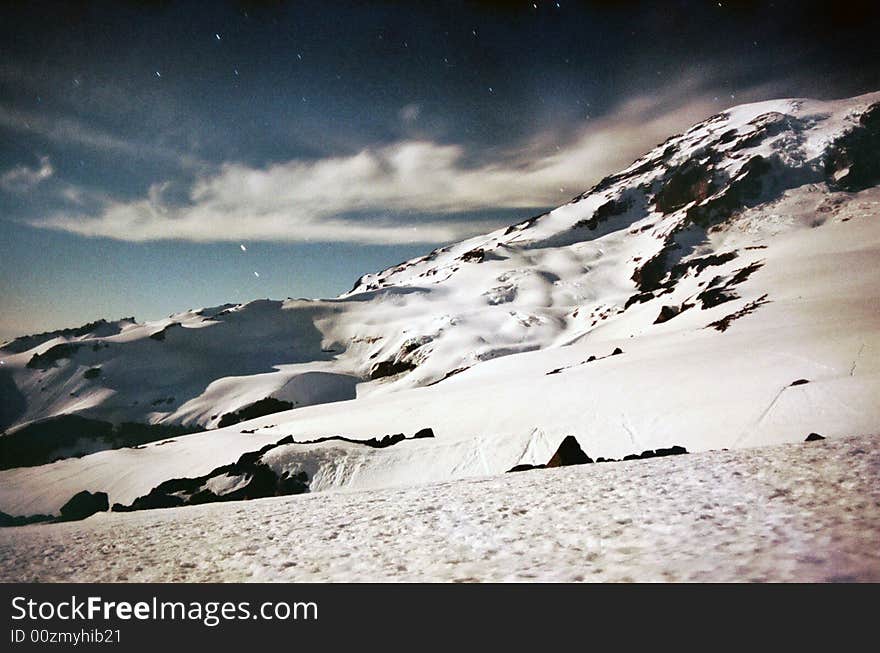 Mount Rainier as seen during a full moon night at 8,000 ft. Mount Rainier as seen during a full moon night at 8,000 ft