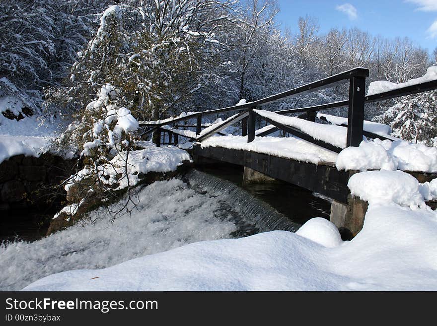 Bridge over a waterfall of Ebro on a spring, Cantabria