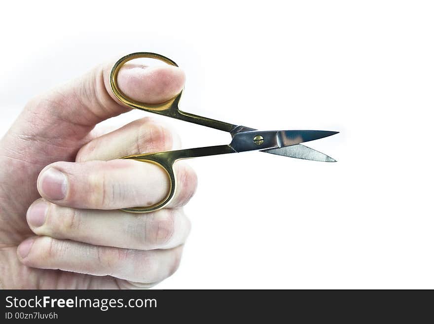 hand with manicure scissors