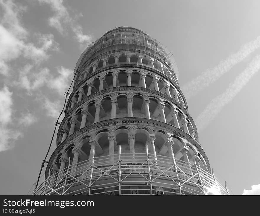 The Leaning Tower of Pisa -  The 14,500 ton, 8 story Bell Tower was begun in 1173.  Ten years later construction was halted (at 3 stories) because it was already visibly leaning.  From 1275-1284 a second architect slightly altered the angle and added to the building , only to stop after 7 stories because the lean worsened.  Finally in the mid 14th Century the belfry was added making the tower 180 feet high.