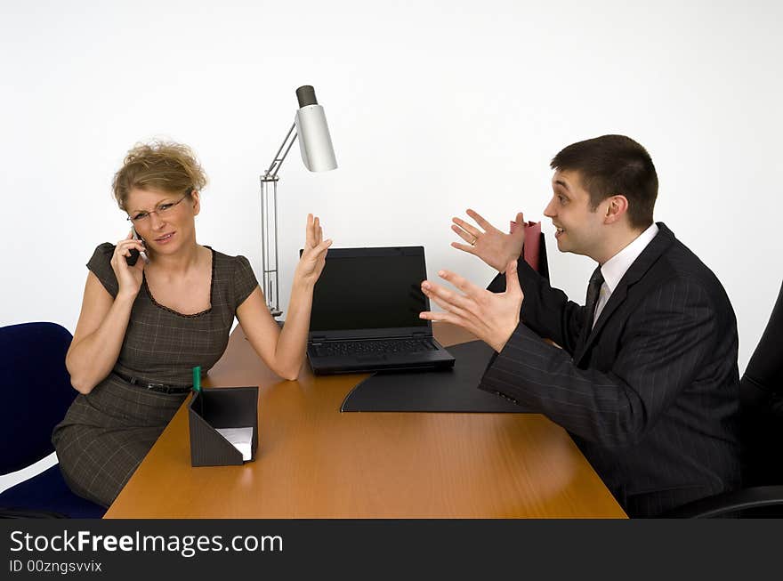 Business woman and businessman in office. Business woman and businessman in office.