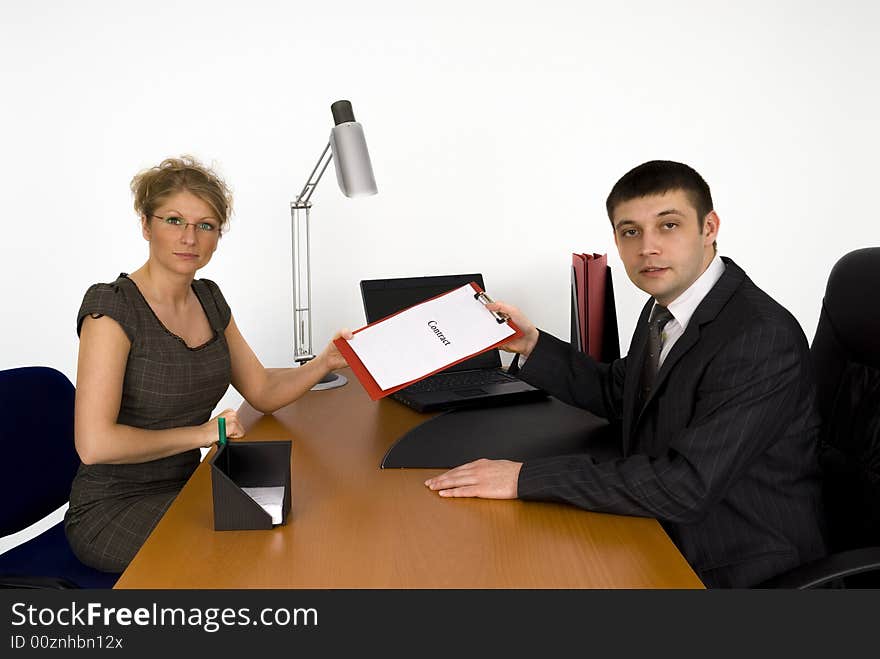 Businesswoman and businessman in office. Businesswoman and businessman in office.