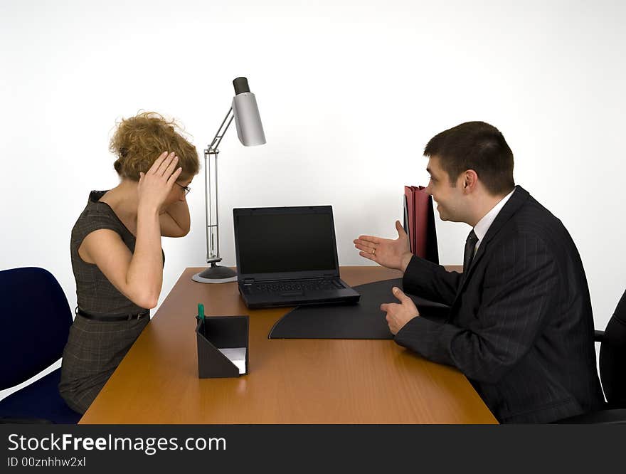 Businesswoman and businessman in office. Businesswoman and businessman in office.