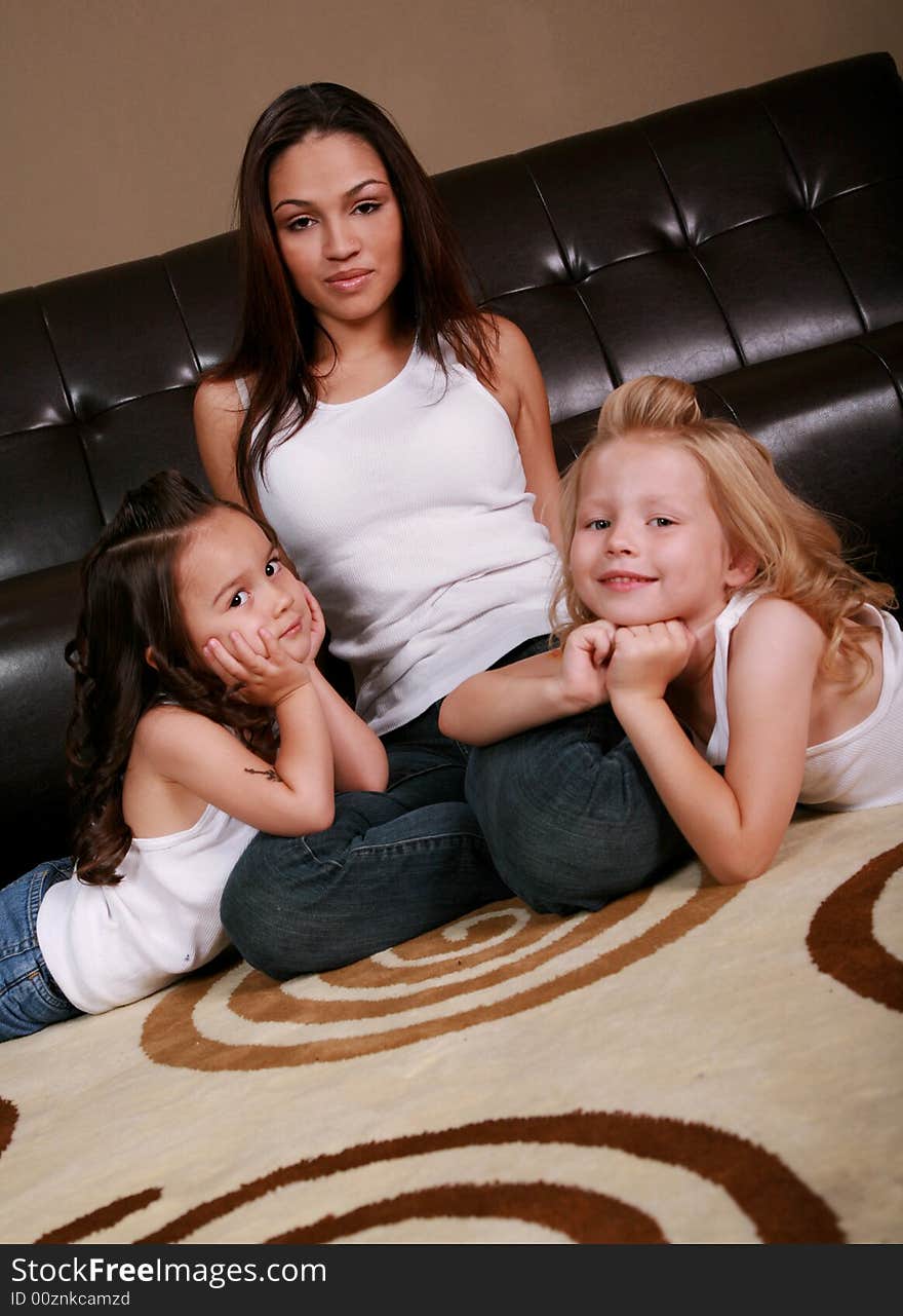 Beautiful and Happy Mother Surrounded by her daughters. Beautiful and Happy Mother Surrounded by her daughters