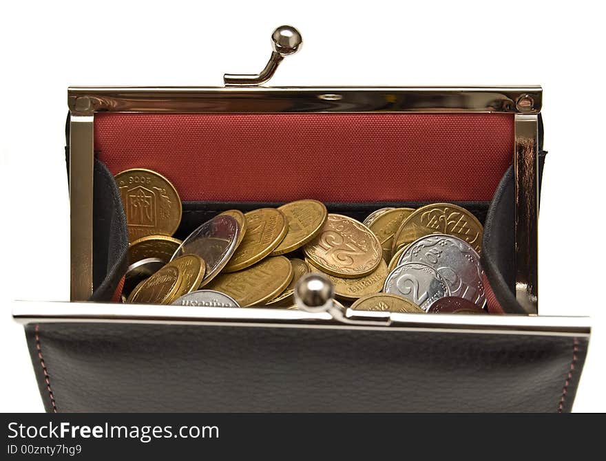 Purse and coins on a white