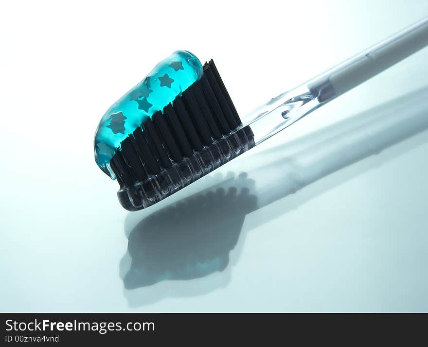 Closeup of tooth brush with blue tooth paste. Closeup of tooth brush with blue tooth paste