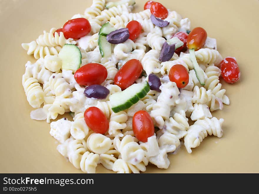 Cold Pasta Salad with tomatoes, cucumbers and olives. Cold Pasta Salad with tomatoes, cucumbers and olives