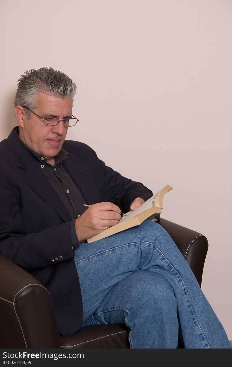 A man reading a book during a break of the day