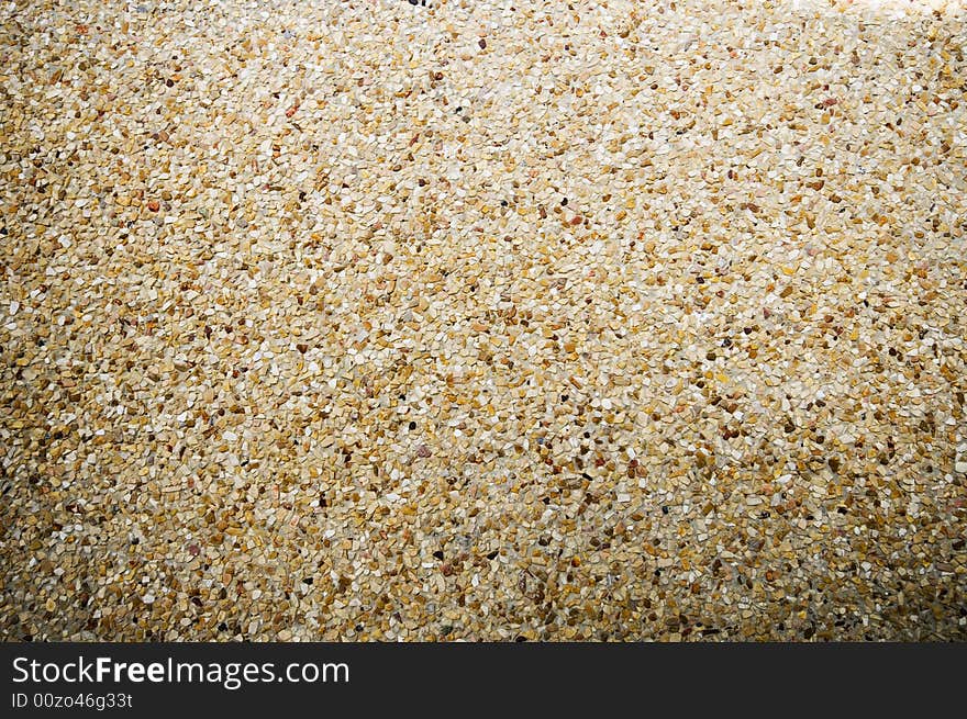 Close up of small pebbles in concrete. Close up of small pebbles in concrete.