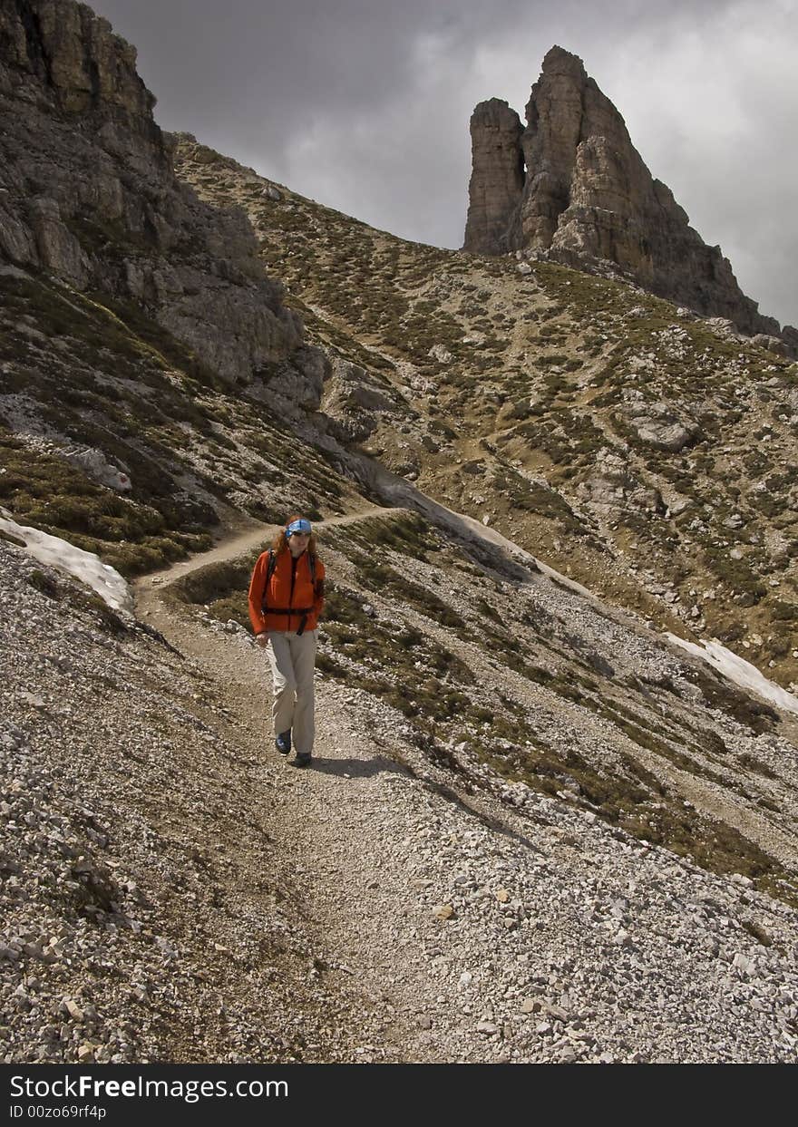 Woman trekking in Dolomites