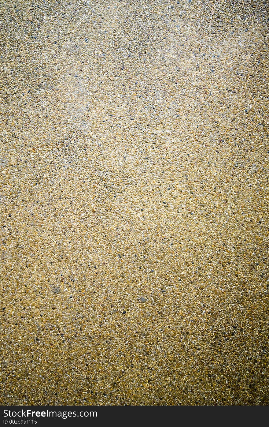 Close up of small pebbles in concrete. Close up of small pebbles in concrete.