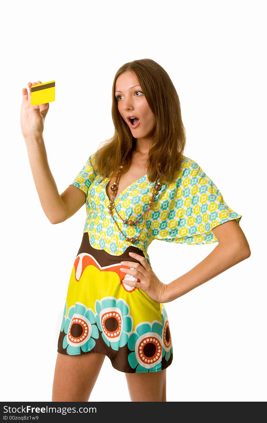 Astonished woman with credit card isolated on white background