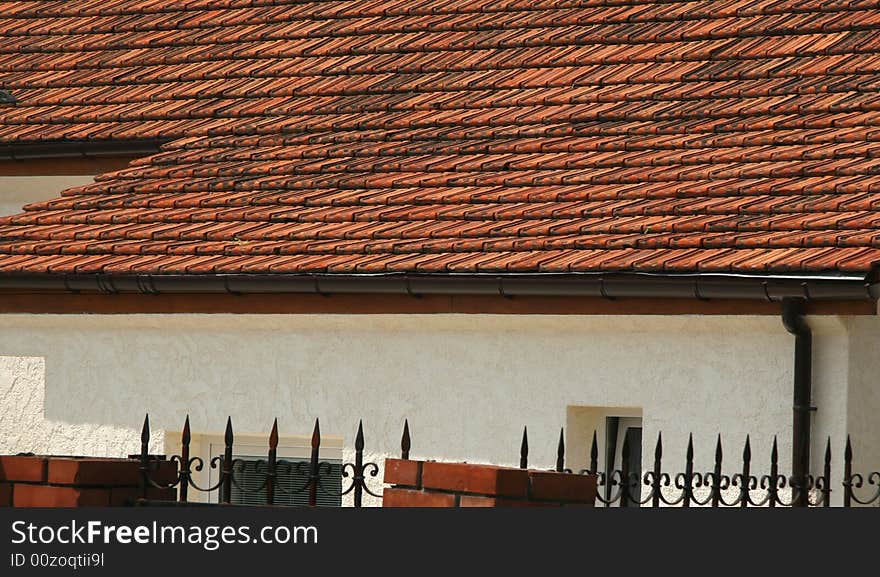 Roofs covered by a red tile