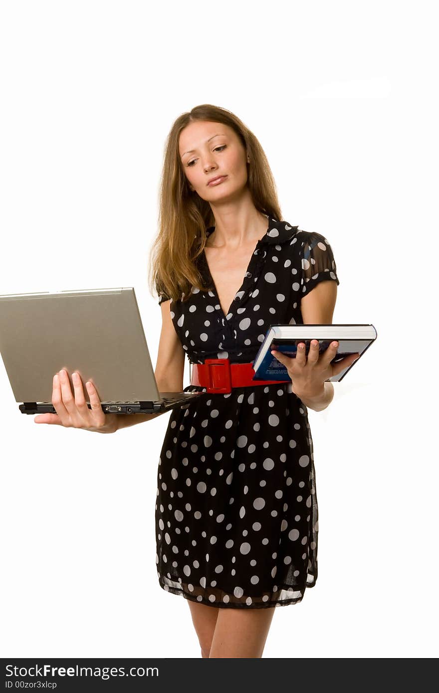 Student with book and laptop.