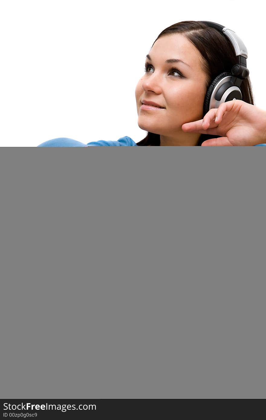 Attractive woman with headphones on sofa. Attractive woman with headphones on sofa