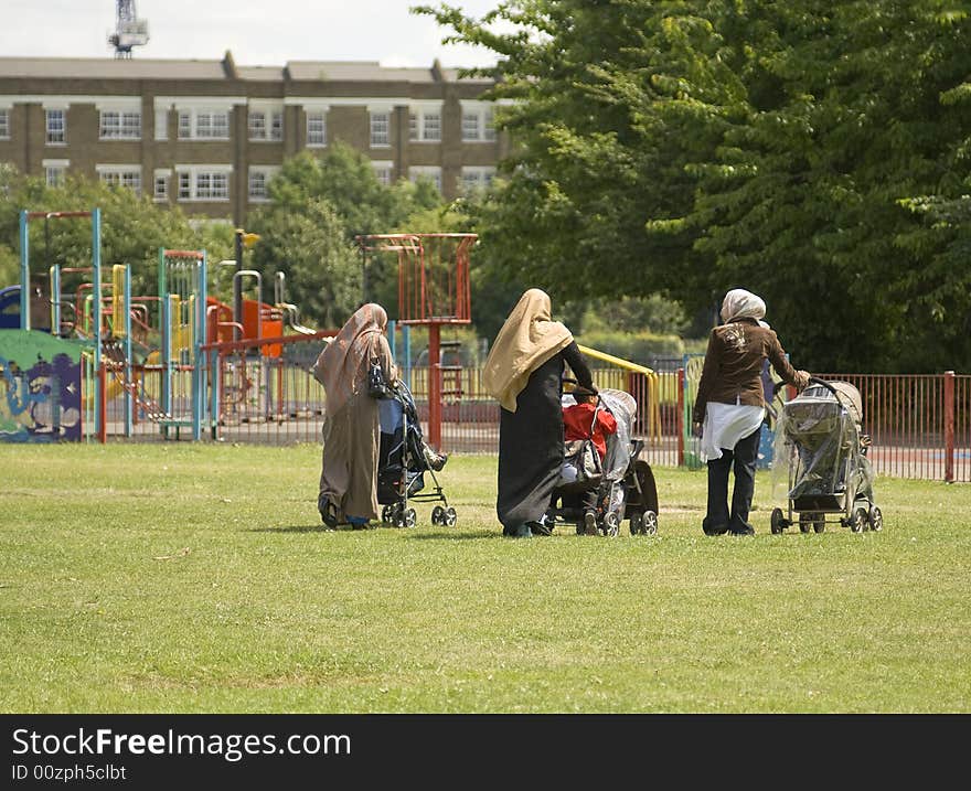 Three Women in Park with Prams. Three Women in Park with Prams.