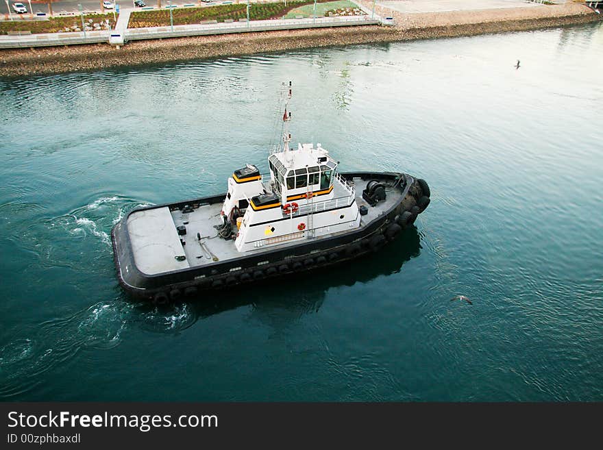Tug Boat from Ship with a walkway and landing pad