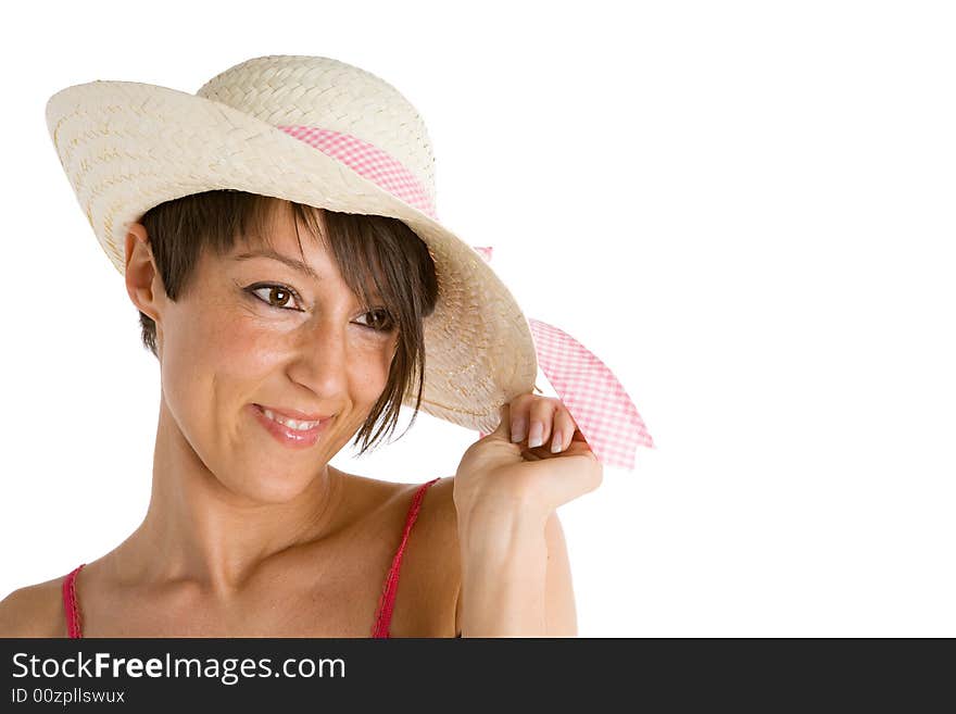 Young woman smiling wearing straw hat. Young woman smiling wearing straw hat