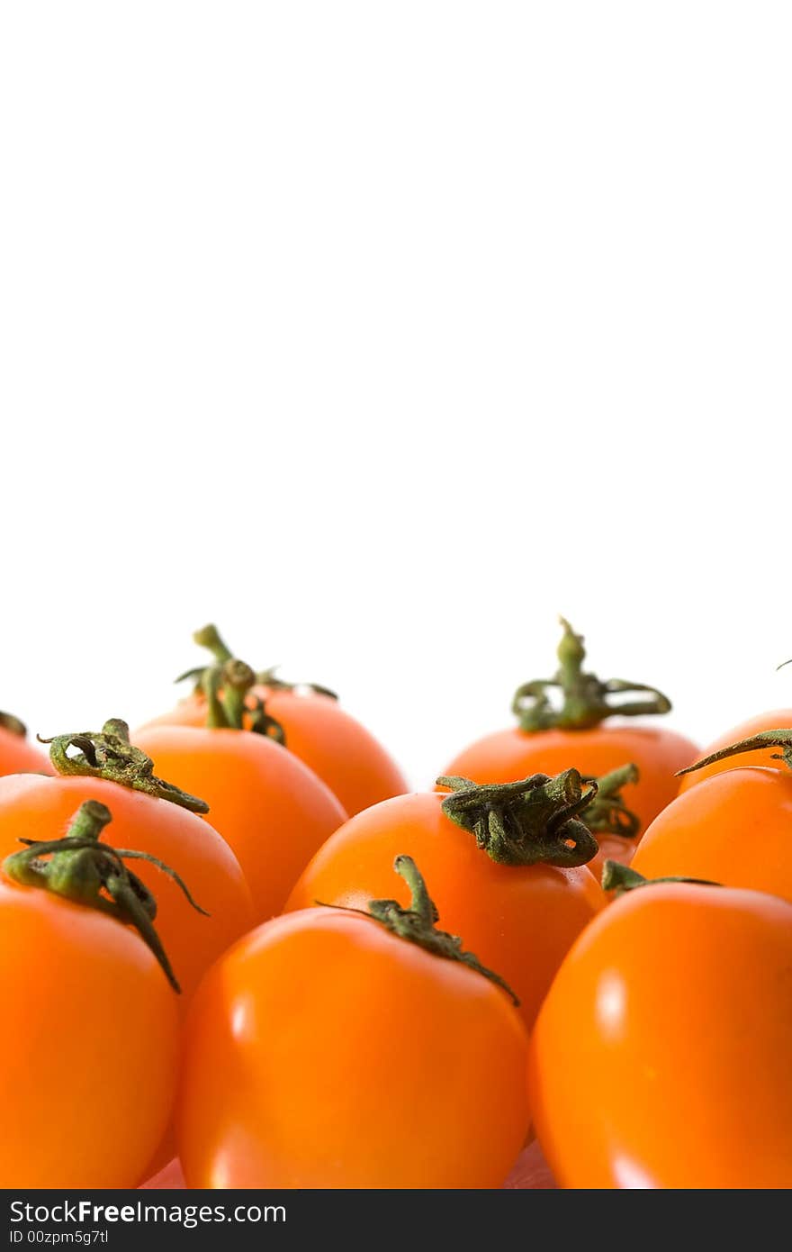 Red cherry tomatoes bottom position with white background, copy space for the text