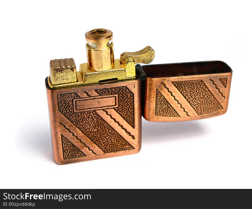 Old Bronze lighter on a white background