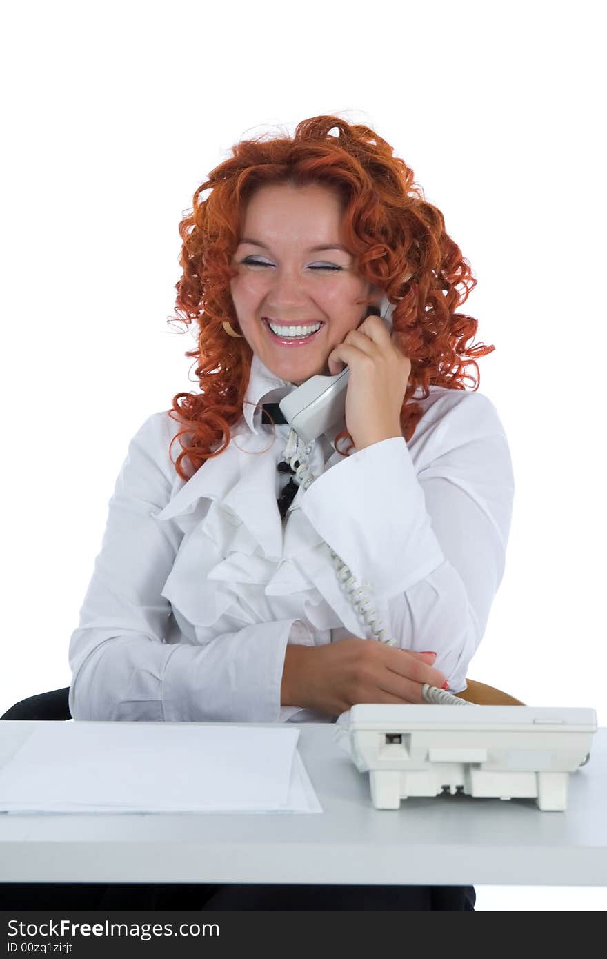 Beautiful young businesswoman calling in office