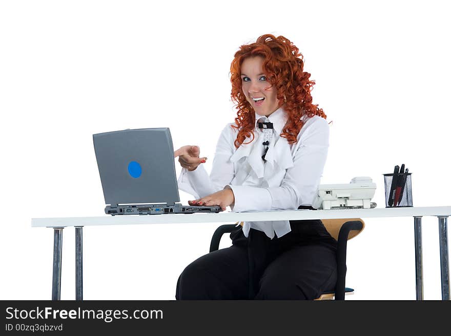 Beautiful young businesswoman calling in office