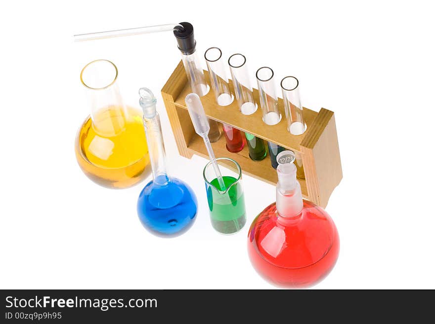 Various colorful glass laboratory ware on a white background. Various colorful glass laboratory ware on a white background