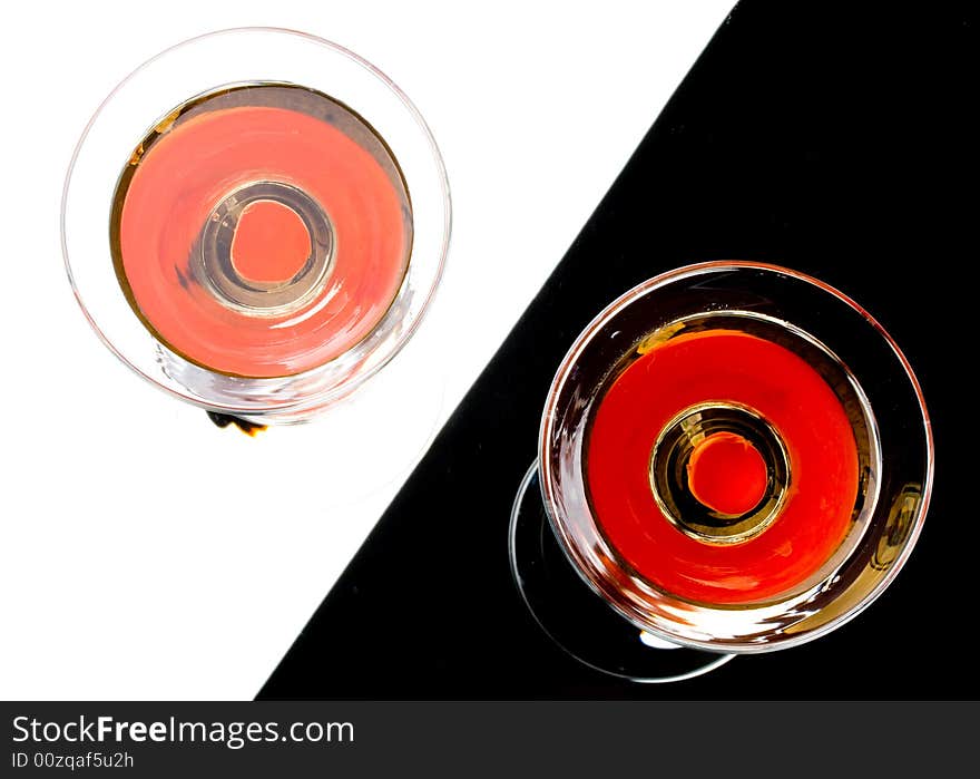 Martini with red cherry in a glass. Martini with red cherry in a glass