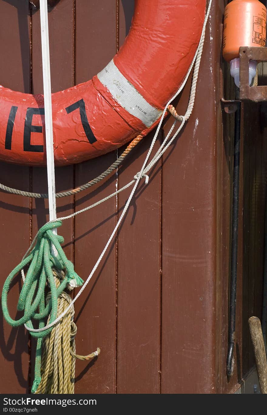 A wooden boat detail with rope