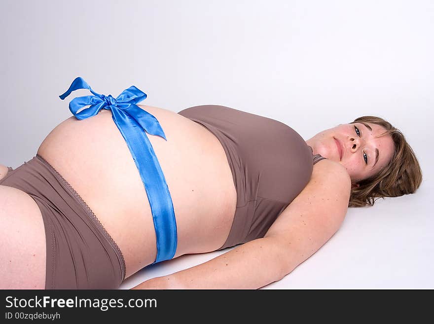 Pregnat woman strapped in blue