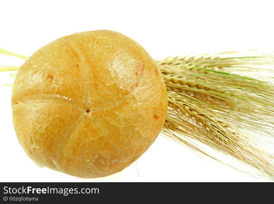 Wheat and bread isolated over white. See my other food images.